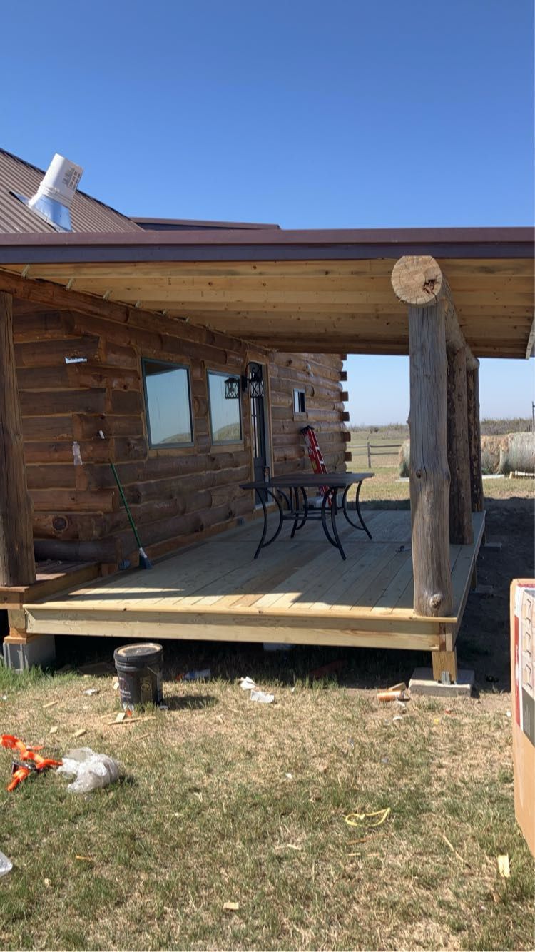 Rustic cabin with wraparound porch